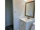 Modern bathroom with a vanity, framed mirror, and new fixtures at 1804 Bayshore Gardens Pkwy, Bradenton, FL 34207