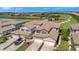 Overhead view of villa complex with access to a golf course and community pond at 18113 Gawthrop Dr # 103, Bradenton, FL 34211