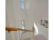Bright foyer with a staircase, high ceilings, and elegant decorative touches at 18113 Gawthrop Dr # 103, Bradenton, FL 34211