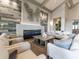 Modern lounge with a fireplace, comfortable seating, and decorative wall art at 18113 Gawthrop Dr # 103, Bradenton, FL 34211