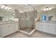 Modern main bathroom featuring a walk-in shower, granite countertops and dual sinks at 18113 Gawthrop Dr # 103, Bradenton, FL 34211