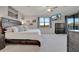 Comfortable main bedroom with a view, ceiling fan, large closet and soft carpet at 18113 Gawthrop Dr # 103, Bradenton, FL 34211