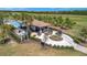 Community pool area with cabana, barbecue, and golf course views at 18113 Gawthrop Dr # 103, Bradenton, FL 34211