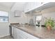 Bright and airy kitchen with lots of counter space, stainless steel appliances and natural light at 2021 Central Ave, Sarasota, FL 34234