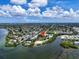 An aerial shot of the neighborhood shows direct access to the bay at 2207 Holyoke Ave, Bradenton, FL 34207