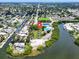 Beautiful aerial view of a waterfront community, showcasing lush landscaping and community pool at 2207 Holyoke Ave, Bradenton, FL 34207