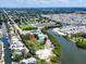 Stunning aerial view showcasing community amenities, waterfront access, and lush landscaping at 2207 Holyoke Ave, Bradenton, FL 34207