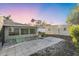 A view of the backyard patio, sunroom, and a shed at 2207 Holyoke Ave, Bradenton, FL 34207