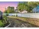The large backyard is lined with a privacy fence and well-kept lawn at 2207 Holyoke Ave, Bradenton, FL 34207