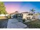 This home features a patio, screened in enclosure, and well-maintained backyard at 2207 Holyoke Ave, Bradenton, FL 34207