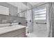 Clean bathroom featuring a shower/tub, vanity, toilet, and bright window at 2207 Holyoke Ave, Bradenton, FL 34207