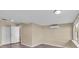 Vacant bedroom with wood-look vinyl flooring, neutral walls, closet and en-suite at 2207 Holyoke Ave, Bradenton, FL 34207