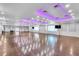 Expansive meeting room with hardwood floors and modern lighting for versatile use at 2207 Holyoke Ave, Bradenton, FL 34207