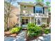 Charming two-story home with landscaped yard, covered entryway, and beautiful natural light at 2409 Gun Flint Trl, Palm Harbor, FL 34683