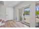 Welcoming entryway with lots of light, featuring modern tile and an inviting view to the neighborhood at 244 Willow Ave, Anna Maria, FL 34216