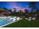 Inviting pool with lounge chairs and lush greenery, ideal for relaxation and outdoor enjoyment at 244 Willow Ave, Anna Maria, FL 34216