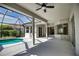Covered patio with screened-in pool area providing an outdoor entertaining space and an inground pool at 271 Petrel Trl, Bradenton, FL 34212