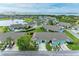 Beautiful aerial view of homes in a waterfront community with a tranquil lake at 3009 Live Oak Ln # 33, Palmetto, FL 34221