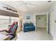 Bonus room with lots of natural light with desk and comfortable seating area at 3009 Live Oak Ln # 33, Palmetto, FL 34221