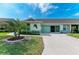 Well-maintained single-story home with manicured lawn, two-car garage, and charming curb appeal at 3009 Live Oak Ln # 33, Palmetto, FL 34221