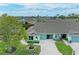 Charming single-story home featuring a well-manicured lawn, a two-car garage, and tranquil neighborhood setting at 3009 Live Oak Ln # 33, Palmetto, FL 34221