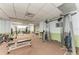 Well-equipped gym featuring weight machines, benches, and various exercise equipment in a brightly lit space at 3009 Live Oak Ln # 33, Palmetto, FL 34221