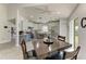 Bright kitchen with stainless steel appliances, gray cabinets, and tiled backsplash at 3009 Live Oak Ln # 33, Palmetto, FL 34221