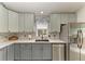 Updated kitchen featuring stainless steel appliances, white backsplash, and light countertops at 3009 Live Oak Ln # 33, Palmetto, FL 34221