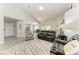 Open-concept living area features tile flooring with a seamless transition to the kitchen and dining area at 3009 Live Oak Ln # 33, Palmetto, FL 34221