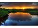 Picturesque sunset view over a calm waterway, with the sun reflecting on the water at 3009 Live Oak Ln # 33, Palmetto, FL 34221
