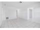 Bright living space showcasing tile flooring and a hallway with closet at 314 Signorelli Dr, Nokomis, FL 34275