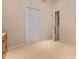 Neutral bedroom with a closet and ample natural light at 3456 Parkridge Cir # 33-105, Sarasota, FL 34243