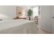 Comfortable bedroom featuring light walls, stylish decor, and a large window for ample natural light at 3456 Parkridge Cir # 33-105, Sarasota, FL 34243