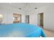 Bright bedroom features ensuite bathroom and walk-in closet access at 3456 Parkridge Cir # 33-105, Sarasota, FL 34243