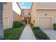 Inviting multi-Gathering home with manicured landscaping leading to charming entrances and private garages at 3456 Parkridge Cir # 33-105, Sarasota, FL 34243