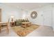 Comfortable living room featuring tile flooring and neutral décor, offering a serene and inviting atmosphere at 3456 Parkridge Cir # 33-105, Sarasota, FL 34243