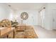 Comfortable living room featuring tile flooring and neutral décor, offering a serene and inviting atmosphere at 3456 Parkridge Cir # 33-105, Sarasota, FL 34243