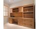 Office featuring built-in shelving, desk space, and a window at 3456 Parkridge Cir # 33-105, Sarasota, FL 34243