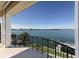 This home offers a private balcony overlooking the serene water at 348 W Royal Flamingo Dr, Sarasota, FL 34236