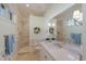 Bathroom featuring a large mirror and a step-in shower at 348 W Royal Flamingo Dr, Sarasota, FL 34236