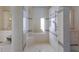 Modern bathroom with walk-in shower featuring double shower heads and built-in seating at 348 W Royal Flamingo Dr, Sarasota, FL 34236