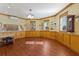 Large bonus room with wood flooring and beautiful wall detail at 348 W Royal Flamingo Dr, Sarasota, FL 34236