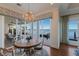 Elegant dining area showcasing water views and stylish furnishings at 348 W Royal Flamingo Dr, Sarasota, FL 34236