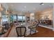 Luxurious living room featuring a fireplace, water views, and elegant furnishings at 348 W Royal Flamingo Dr, Sarasota, FL 34236