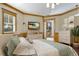 Calming main bedroom with wood floors, wooden trim, and views into the home and outdoors at 348 W Royal Flamingo Dr, Sarasota, FL 34236