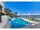 View of the pool and bay with a dock at 348 W Royal Flamingo Dr, Sarasota, FL 34236