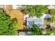 Birds eye view of the house surrounded by green grass and trees at 3512 N 10Th St, Tampa, FL 33605