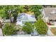 Aerial view of the house surrounded by green foliage and grass at 3512 N 10Th St, Tampa, FL 33605