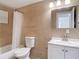 Bathroom featuring a bathtub with shower and a single sink vanity at 3512 N 10Th St, Tampa, FL 33605