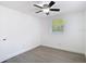 Bedroom featuring a ceiling fan and a window with bright natural light at 3512 N 10Th St, Tampa, FL 33605